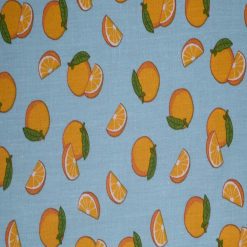 Oranges on Teal Cotton Fabric by Quilter s Showcase
