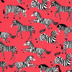 Zebras On Coral Novelty Cotton Fabric